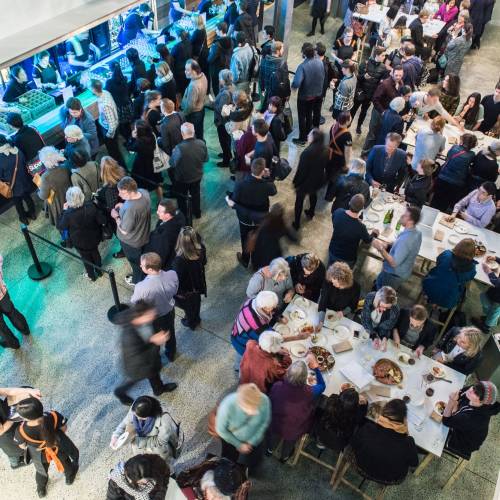 People gathering around food