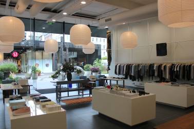 Garments and accessories displayed in showroom