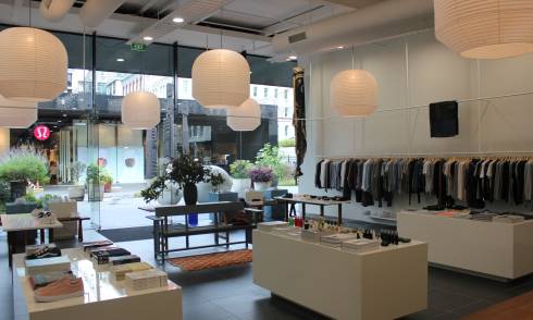 Garments and accessories displayed in showroom