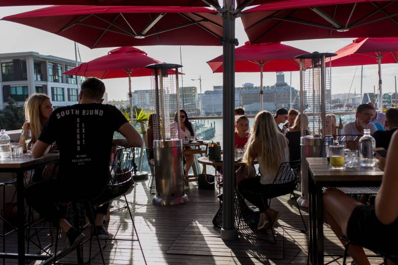 People enjoying roof top deck