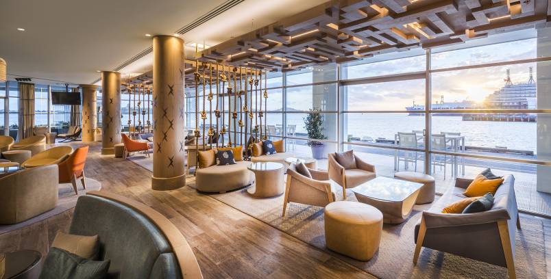 Bar seating area with the waterfront outside